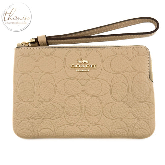 COACH Corner Zip Wristlet In Signature Leather